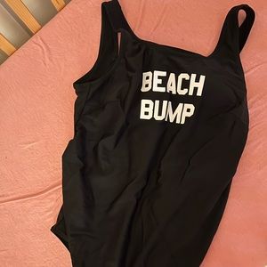 Motherhood Black One-Piece Swimsuit with White 'BEACH BUMP' Graphic